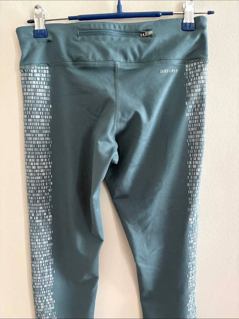 Nike Dri-Fit Teal-Green Athletic Leggings with Reflective Side Panels